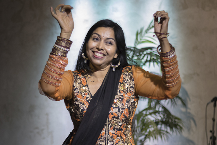 Teacher Shama Jha is showing some dance movements.