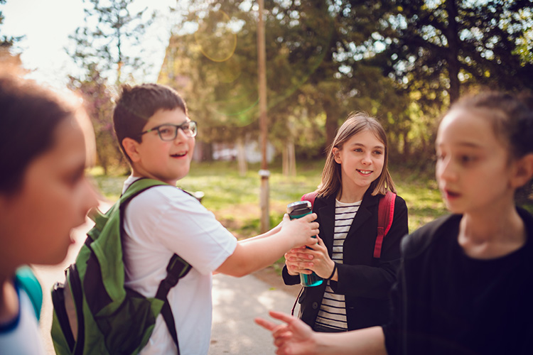 school kids playing outdoors