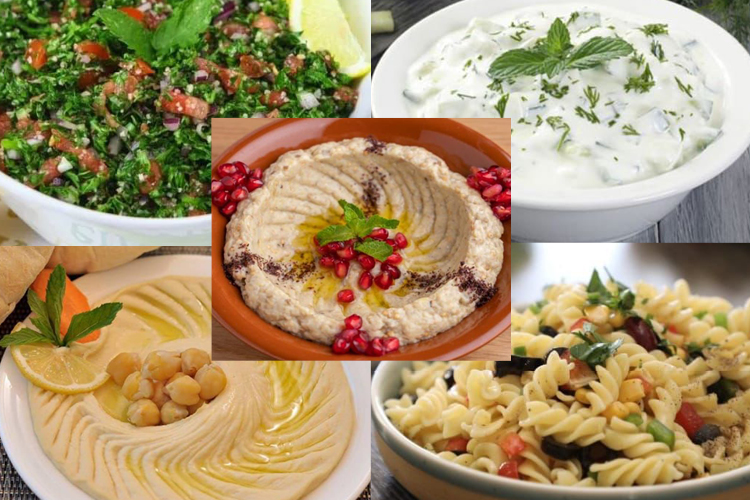 Tabbouleh-salaatti, tsatsiki, hummus, munakoisotahna ja pastasalaatti. 
